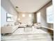 Bright living room with a comfortable sofa and a large rug at 14521 Tanja King Blvd, Orlando, FL 32828