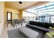 Modern screened patio with sleek furniture and a view of the pool at 14521 Tanja King Blvd, Orlando, FL 32828