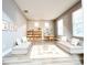 Bright playroom with soft sofas and carpet at 14521 Tanja King Blvd, Orlando, FL 32828