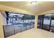 Covered patio and screened-in pool area with safety fence, providing a secure and enjoyable outdoor space at 14521 Tanja King Blvd, Orlando, FL 32828
