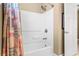 Bathroom with a shower featuring colorful curtains at 14738 Porter Rd, Winter Garden, FL 34787