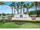 Welcoming Summerlake community entrance with lush landscaping and attractive signage at 14738 Porter Rd, Winter Garden, FL 34787