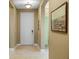 Inviting entryway with tile flooring, neutral paint, and stylish accents, creating a welcoming ambiance at 14738 Porter Rd, Winter Garden, FL 34787