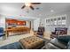 Open-concept living space featuring a spacious seating area, large kitchen, and dining table, perfect for entertaining at 14738 Porter Rd, Winter Garden, FL 34787