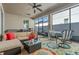 Cozy covered patio with ample seating, stylish decor, and convenient outdoor dining area at 14738 Porter Rd, Winter Garden, FL 34787