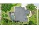 Overhead aerial view of the roof and screened in pool at 158 Hickory Stick Ct, Debary, FL 32713