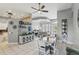 Spacious dining room with a view of the living area, featuring modern decor and ample natural light at 158 Hickory Stick Ct, Debary, FL 32713