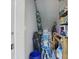 Organized pool supply storage with chemicals, tools, and accessories neatly arranged at 158 Hickory Stick Ct, Debary, FL 32713