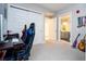 This bedroom also has an ensuite bathroom. The room is brightly lit and has carpeted floors at 16300 County Road 455 # 606, Montverde, FL 34756