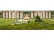 Sprawling condominium complex with a large pool, manicured lawns, and lush landscaping creating an inviting community atmosphere at 16300 County Road 455 # 606, Montverde, FL 34756
