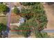 Aerial view outlining property boundaries featuring mature trees and surrounding neighborhood at 201 Glenn St, Leesburg, FL 34748
