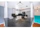 Stylish kitchen with granite countertops, stainless steel appliances, and an open layout, great for entertaining at 201 Glenn St, Leesburg, FL 34748