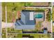 Aerial view of the home showcasing the roof, pool, and backyard at 20321 Majestic St, Orlando, FL 32833