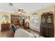 Cozy living room with a comfortable seating area, classic wooden furniture, and bright natural light at 20321 Majestic St, Orlando, FL 32833