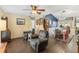 Open-concept living room seamlessly connects to the dining area, creating an ideal space for Gathering gatherings at 20321 Majestic St, Orlando, FL 32833