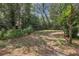 Empty backyard lot ready for landscaping and outdoor activities at 204 Green Lake Cir, Longwood, FL 32779