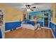 Bright, bedroom featuring lively colors, hardwood floors, and plenty of space for play at 204 Green Lake Cir, Longwood, FL 32779