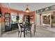 Inviting dining room featuring colorful walls and view of the office at 204 Green Lake Cir, Longwood, FL 32779