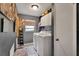Functional laundry room with washer, dryer, storage cabinets, and a window for natural light at 204 Green Lake Cir, Longwood, FL 32779