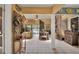 Open-concept living space with tile flooring, dining area, and access to the outdoor area and natural lighting at 204 Green Lake Cir, Longwood, FL 32779