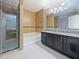 Bathroom featuring a walk-in shower, soaking tub, and double sink vanity at 2120 Lilipetal Ct, Sanford, FL 32771