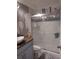 Modern bathroom features a bowl sink, marble-look tiled shower, and updated fixtures at 2120 Lilipetal Ct, Sanford, FL 32771