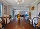 Open dining room view into living room, showcasing the home's layout and flow at 2120 Lilipetal Ct, Sanford, FL 32771