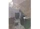 Exterior of the home showing AC unit and trash receptacles at 2120 Lilipetal Ct, Sanford, FL 32771
