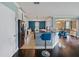 Modern kitchen with stainless steel appliances, granite countertops, and breakfast bar at 2120 Lilipetal Ct, Sanford, FL 32771