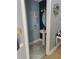 Cozy powder room with pedestal sink, modern fixtures and decorated walls showcases style at 2120 Lilipetal Ct, Sanford, FL 32771