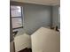 Bright staircase with white bead board wainscoting leads upstairs, offering natural light at 2120 Lilipetal Ct, Sanford, FL 32771