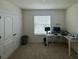 Bright bedroom with a double door closet and a large window for natural light at 2252 Tay Wes Dr, St Cloud, FL 34771