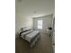 Cozy bedroom with a comfortable bed and carpeted floors at 2252 Tay Wes Dr, St Cloud, FL 34771