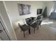 Stylish dining area featuring a modern glass table and comfortable seating at 2252 Tay Wes Dr, St Cloud, FL 34771