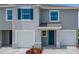 Charming two-story home with attached two-car garage and a welcoming front entrance at 2252 Tay Wes Dr, St Cloud, FL 34771