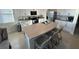 Modern kitchen with stainless steel appliances, a kitchen island, and white cabinetry at 2252 Tay Wes Dr, St Cloud, FL 34771