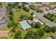 Aerial view of the community pool, playground and tennis courts at 2340 Hinsdale Dr, Kissimmee, FL 34741