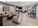 Spacious living room with open floor plan and seamless flow to the kitchen and dining areas at 2367 Distant Sun Trl, Kissimmee, FL 34747