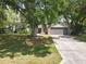 Charming home with a well-manicured lawn and attached two-car garage at 2647 Lake Landing Blvd, Eustis, FL 32726