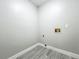 Clean utility room with updated flooring and ample space for appliances at 2647 Lake Landing Blvd, Eustis, FL 32726