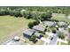 Neighborhood with homes and a large open field at 2865 Running Brook Cir, Kissimmee, FL 34744