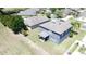 Aerial view of the backyard featuring a white picket fence and covered patio at 2865 Running Brook Cir, Kissimmee, FL 34744