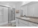 Bathroom with white cabinets, toilet, shower and sink at 3039 Springwell Loop, Orlando, FL 32808