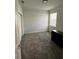 Bright bedroom featuring gray carpet, a closet, and a window that provides natural light at 34071 Sky Blossom Cir, Leesburg, FL 34788
