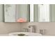 Close up of the bathroom sink and mirror featuring a unique design at 3517 Merivale Dr, Casselberry, FL 32707