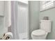 Bright bathroom showcasing a walk-in shower and modern toilet at 3517 Merivale Dr, Casselberry, FL 32707
