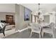 Open floor plan with view of dining room that features a stylish chandelier and seating for six at 3517 Merivale Dr, Casselberry, FL 32707