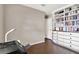 Bright office space featuring built-in bookcase and storage drawers on patterned floors at 3517 Merivale Dr, Casselberry, FL 32707