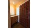 Inviting entryway featuring a classic wooden door and built-in cabinetry, creating a warm welcome at 361 Tulip Trl, Casselberry, FL 32707