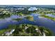 Beautiful aerial view showcasing the lakes and lush greenery surrounding the property and neighborhood at 407 Sheryl Dr, Deltona, FL 32738
